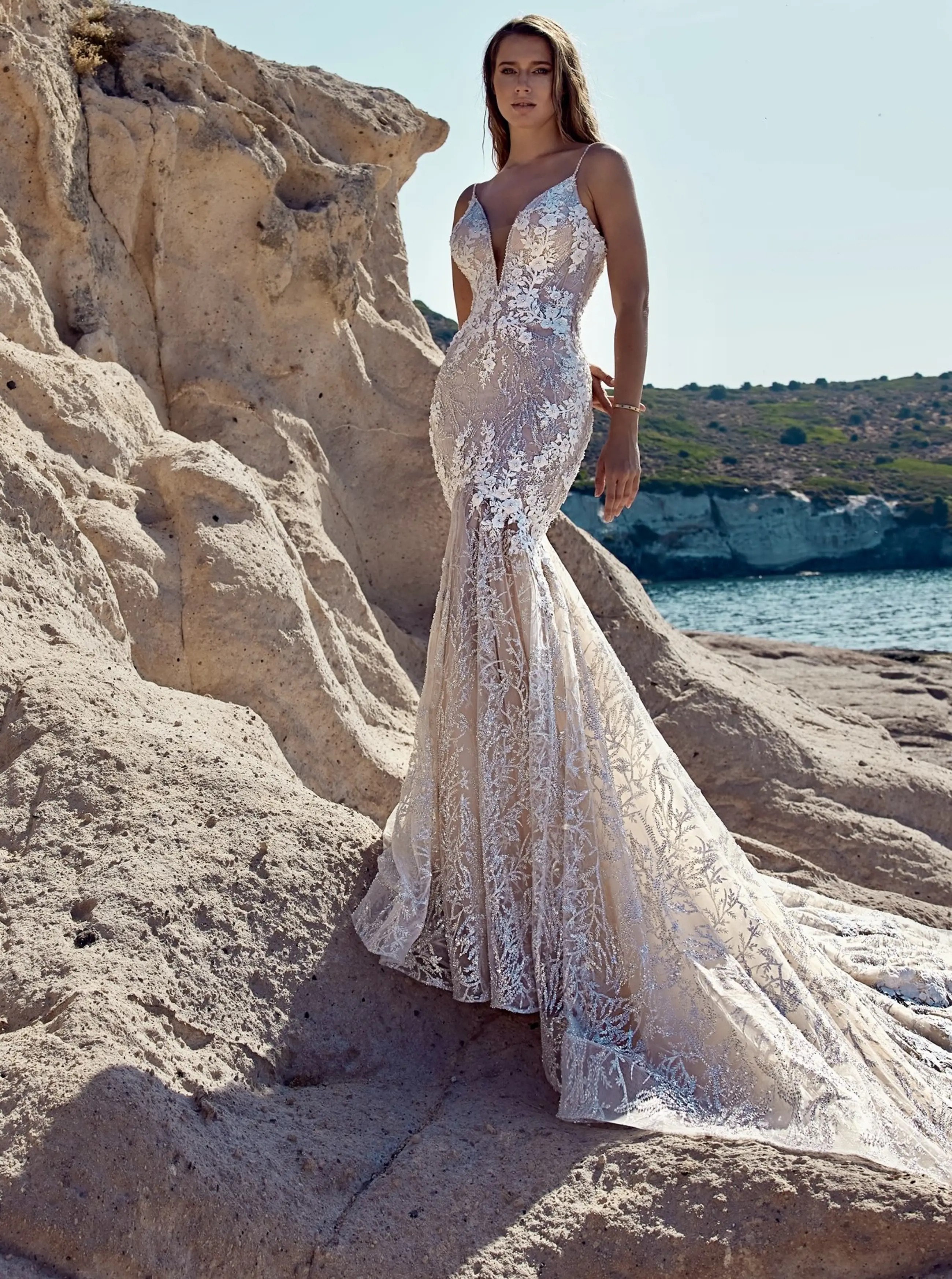 Model wearing a white Madam Burcu dress